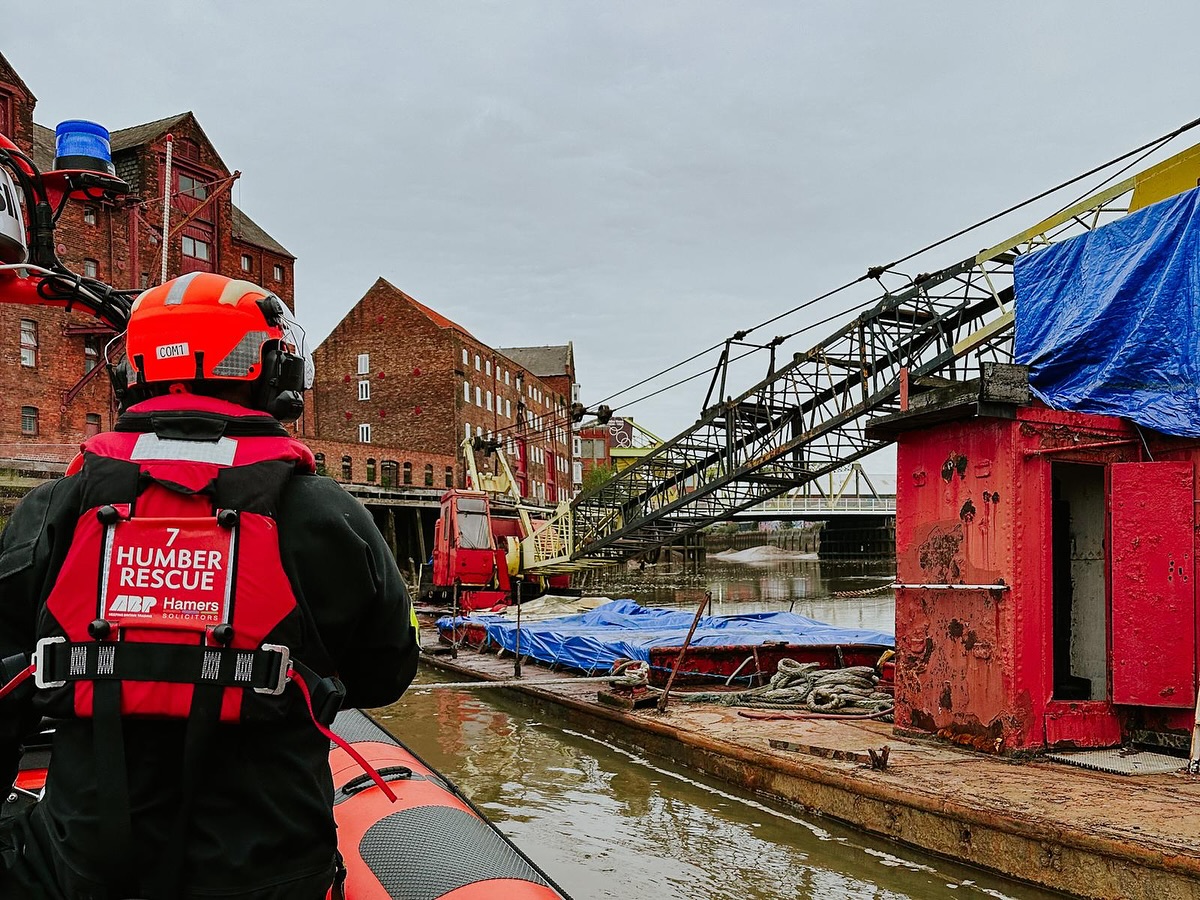 🚨 CALL-OUT 🚨

05:41 02/05/25 - Tasked by Humber Coastguard to reports of a sinking vessel on the River Hull, approximately 50 metres south of Drypool Bridge.

On arrival, our crew found a crane barge that had broken free of its moorings and was listing heavily to starboard, partially blocking the river. A crew member was placed on board to assess the situation, but within minutes the stern of the vessel began to take on water, and they were swiftly recovered back to our boat for safety.

The barge continued to deteriorate and eventually began sinking. We stood by on scene until 07:20, working alongside the Harbourmaster, Coastguard, and one of the vessel’s owners, before returning to station when no further assistance could be given.

The vessel has since come to rest further along the River Hull near Old Town, between Drypool Bridge and Myton Bridge.

Team stood down and returned to station.